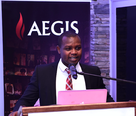 Freddy Mutanguha, Aegis Trust Regional Director, welcomes guests to the event marking the International Day of Commemoration and Dignity of Genocide Victims at the Kigali Genocide Memorial