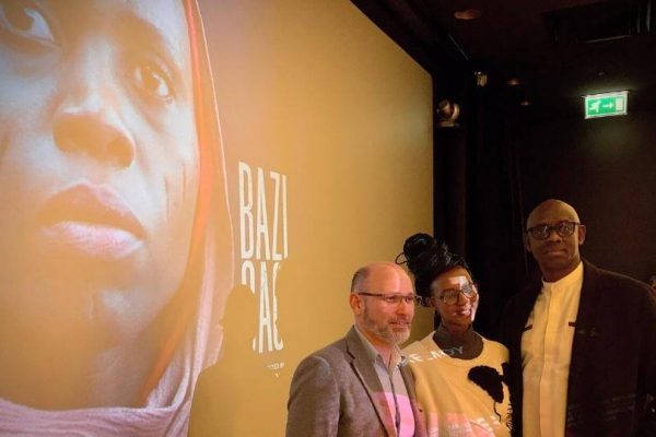 L-R-Aegis-CEO-Dr-James-Smith-with-filmmaker-Jo-Ingabire-and-High-Commissioner-HE-Johnston-Busingye-at-the-London-premiere-of-BAFTA-nominated-short-BAZIGAGA-10-February-2023